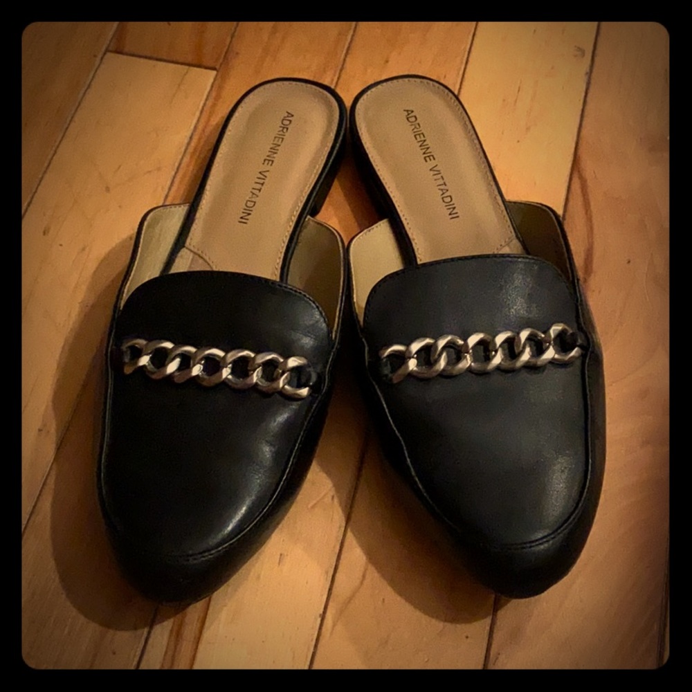 Black leather mules with metal detailing